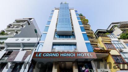 Khách sạn Times Hoàng Cầu Hà Nội Review 2026: Có Nên Ở Hay Không? 4 Phòng ngủ tại Khách sạn Times Hoàng Cầu với giường đôi, nội thất đơn giản và ánh sáng tự nhiên