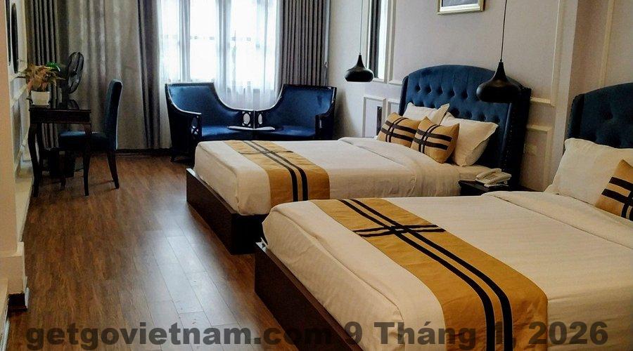 Phòng Family tại S Central Hotel & Spa với hai giường đôi, diện tích rộng