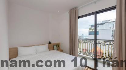 Phòng ngủ khách sạn LUMI West Lake Apartment Hotel