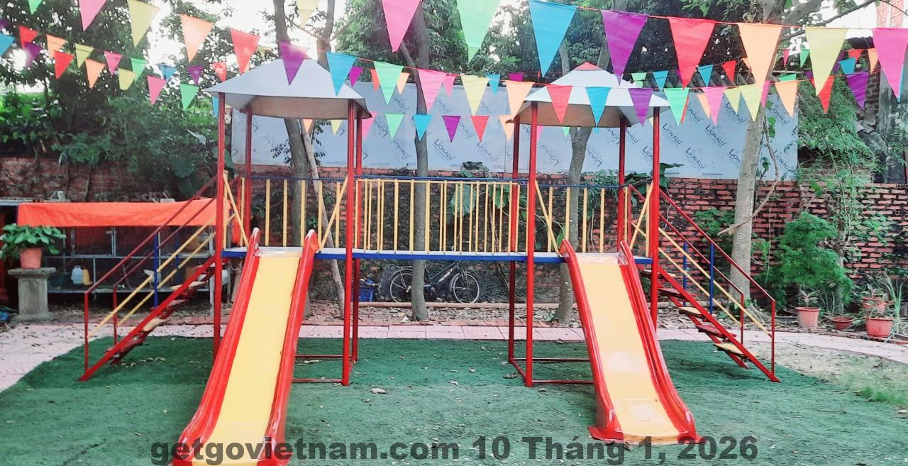 Tổng quan không gian Happy Home Sóc Sơn với nhiều cây xanh, bể bơi ngoài trời và khu sinh hoạt chung rộng rãi