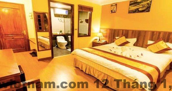 Đánh giá Heart of Sapa Hotel Sa Pa 2026: Ở trung tâm, dịch vụ tốt, có đáng chọn? 4 Không gian phòng ngủ Heart of Sapa Hotel với nội thất gỗ, phong cách ấm cúng