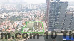 Phòng ngủ tiêu chuẩn tại The Thien Thai Hotel với nội thất gỗ tối màu