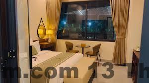 Không gian phòng ngủ tại Mimosa Hotel