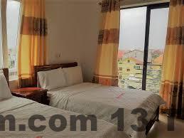 Phòng ngủ tại Thành Đạt 2 Hotel với nội thất gọn gàng và sạch sẽ.