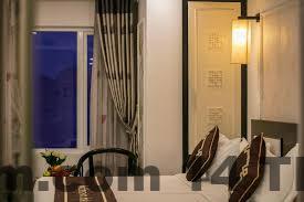 Khu vực lounge và quầy bar nhỏ tại Hanoi Emotion Hotel