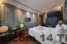 Phòng ngủ Madelise Hanoi View Hotel với giường lớn, nội thất đơn giản, ánh sáng tự nhiên