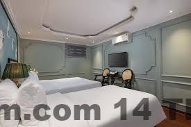 Phòng ngủ tiêu chuẩn tại Madelise Hanoi View Hotel với nội thất hiện đại, diện tích vừa phải