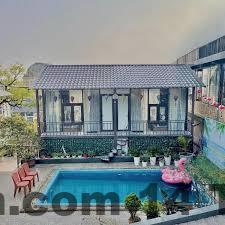 Phòng nghỉ Hà Thành Hotel Tam Đảo với nội thất cơ bản, sạch sẽ
