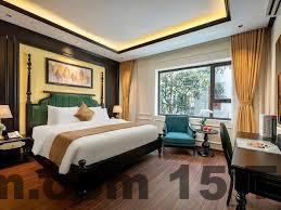 Không gian phòng ngủ Grand Hotel Trịnh Văn Bô phù hợp với khách công tác và lưu trú ngắn ngày