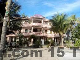 Phòng ngủ tại Khách Sạn Sông Hiến, không gian rộng rãi và sạch sẽ.