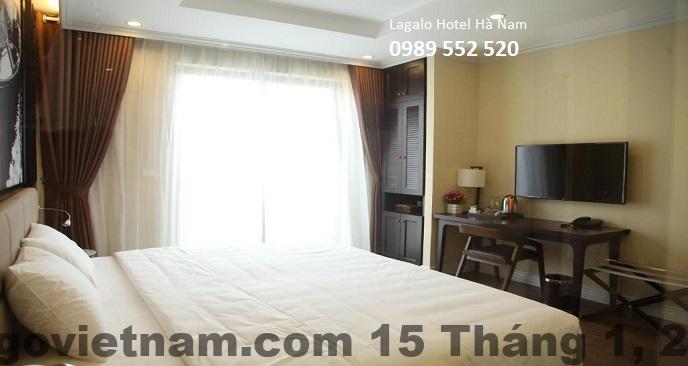 Phòng nghỉ tại khách sạn Lagalo Hotel với không gian rộng rãi và đầy đủ tiện nghi