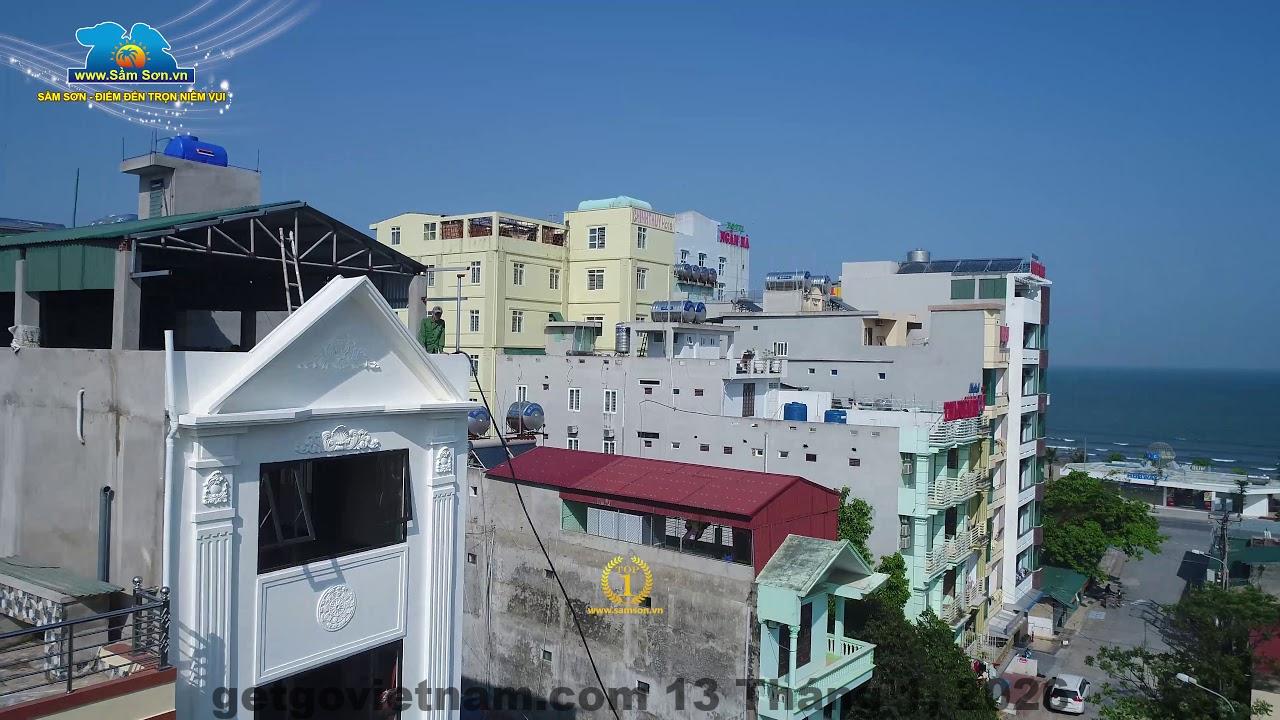 Phòng ngủ tại Khách sạn Vinh Quang, thiết kế đơn giản nhưng sạch sẽ