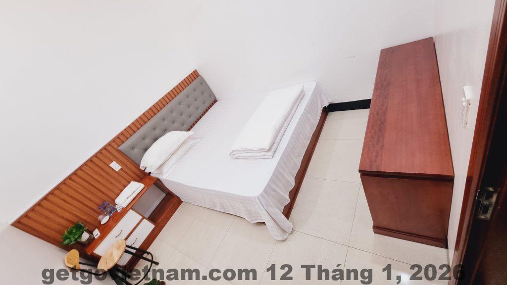 Phòng đơn tại An Vũ Hotel, không gian sạch sẽ và tiện nghi, tạo cảm giác thư giãn cho khách.