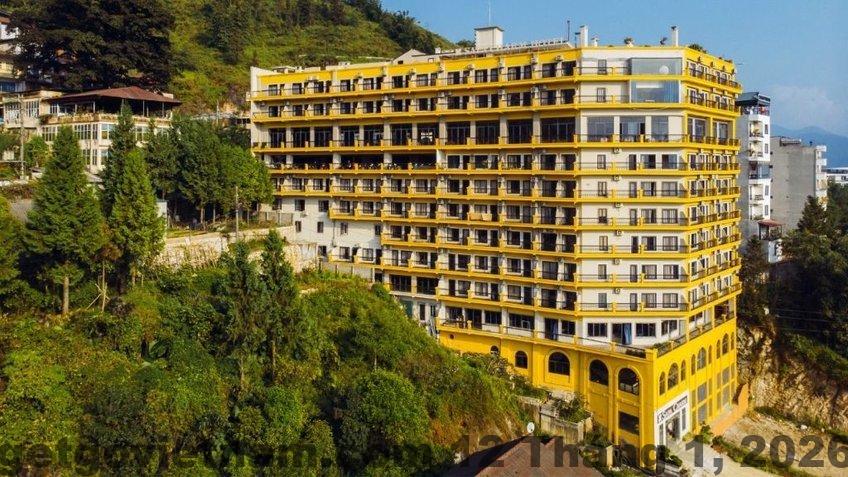 Phòng nghỉ tại Sapa Charm Hotel với nội thất hiện đại và không gian rộng