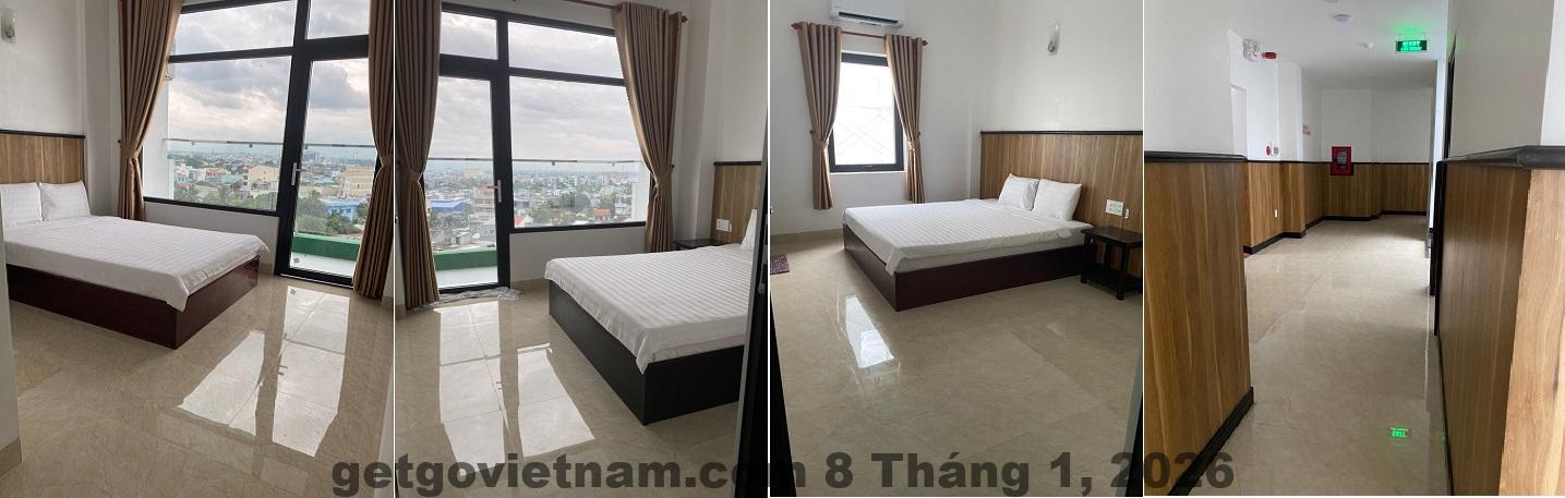 Không gian phòng studio tại Moon Hotel Apartment 3 với giường, bếp và nội thất cơ bản