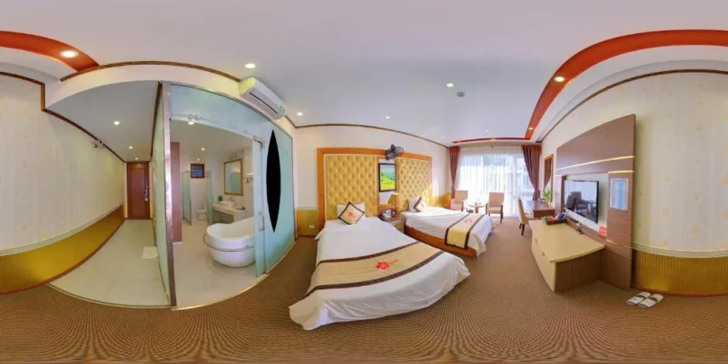 Phòng nghỉ Hoa Dao Hotel Hòa Bình rộng rãi, có ban công và nội thất cơ bản