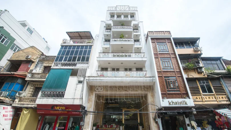 Phòng ngủ tiêu chuẩn tại Hanoi Harmonia Hotel & Spa với thiết kế ấm cúng