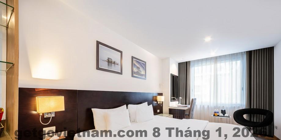 Phòng nghỉ tại Khách Sạn Hương Linh với nội thất cơ bản và không gian vừa phải